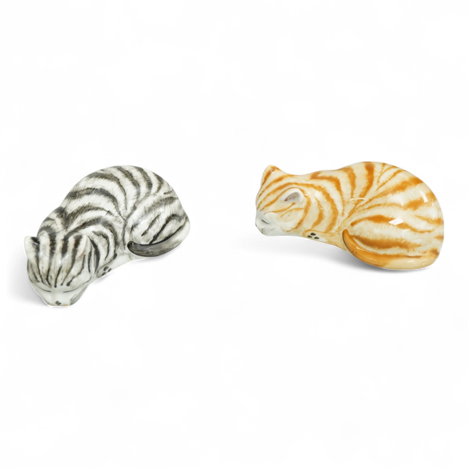 Two Fornasetti models of sleeping cats,9.5cm long